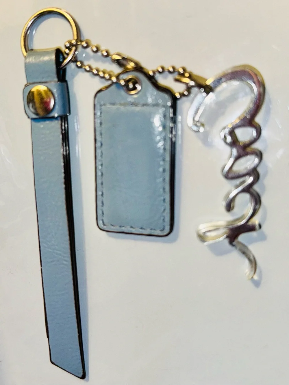 Coach Periwinkle Blue Leather Hangtag, Coach Poppy Script, Tassle, Silver - EUC